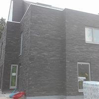 voorgevel verbouwd huis te Hofstade